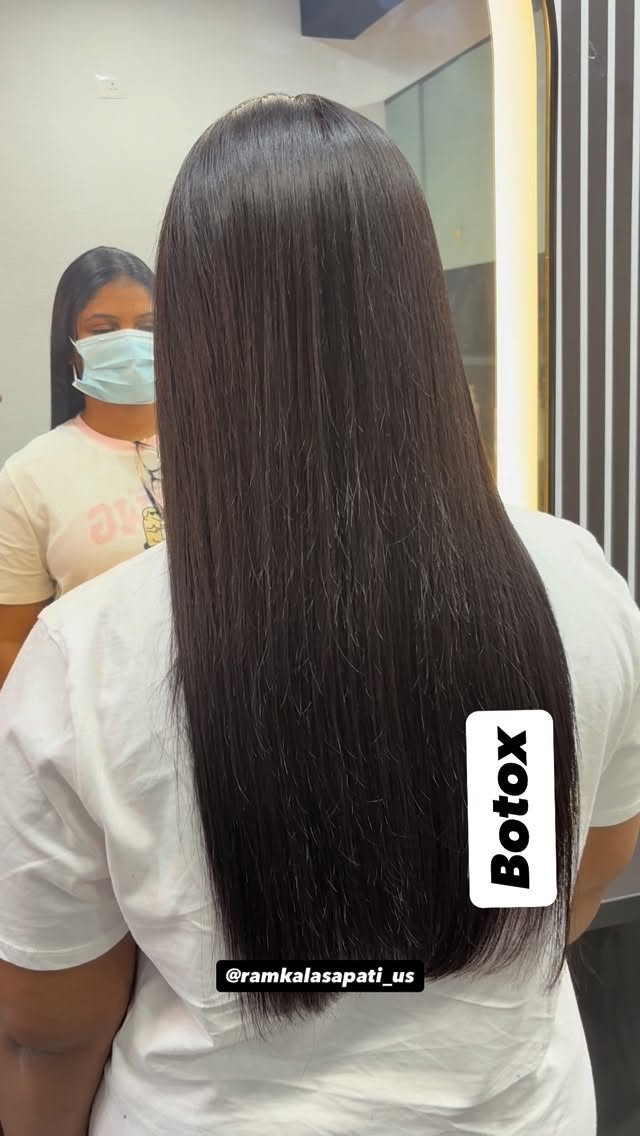 Rear view of long, straight dark hair in the salon's Botox-labelled Instagram reel