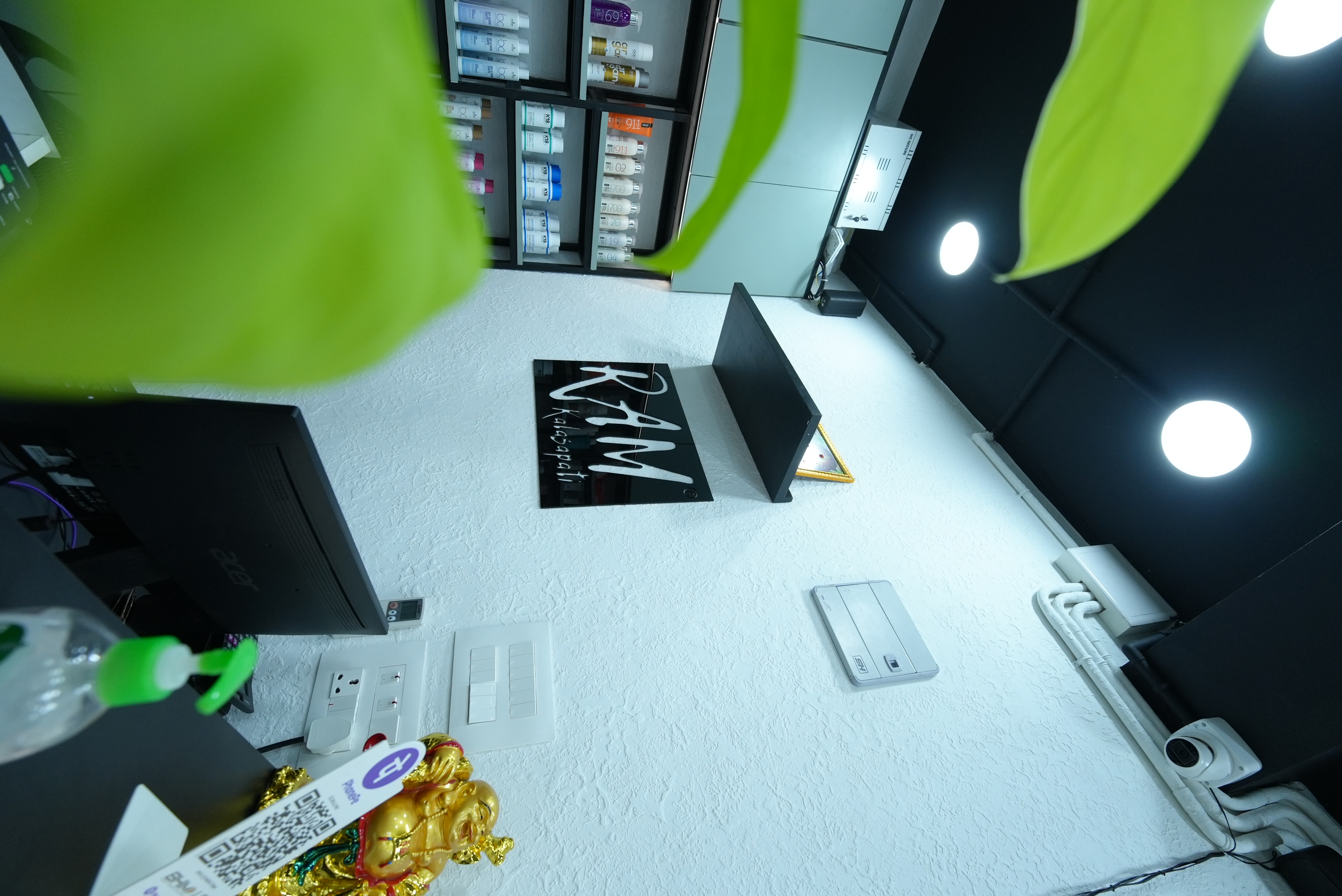RAM KALASAPATI product display and logo wall