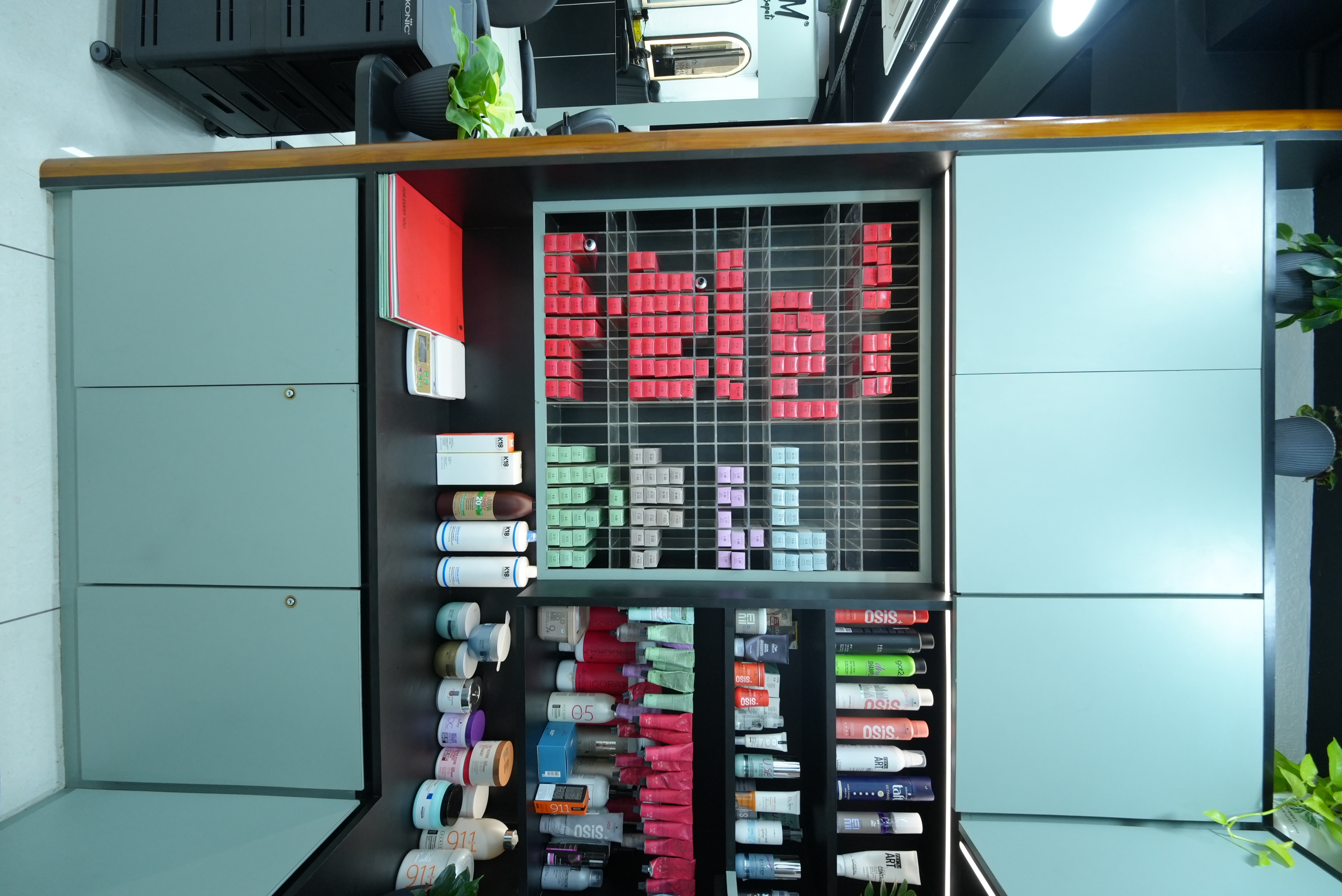 Retail product shelves used for colour care at RAM KALASAPATI